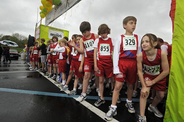 226 82c-39 Sean French Run\n(Near to far) Mackenzie Sparacino of Copake, Evan Foutch of Churchtown, Jimmy Schaible of Hudson and Warren Bradway of Philmont are all students at Taconic Hills and runners with the Glencadia Rod and Gun Club Bullets.  They are lined up for the Meghan's Mile race.