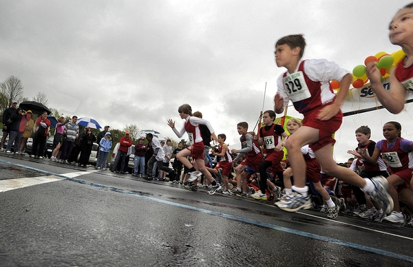 226 82c-47 Sean French Run\nThe start of the Meghan's Mile race.  Foreground are Mackenzie Sparacino and Evan Foutch.